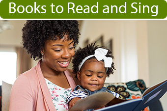 Mother and child reading a song book